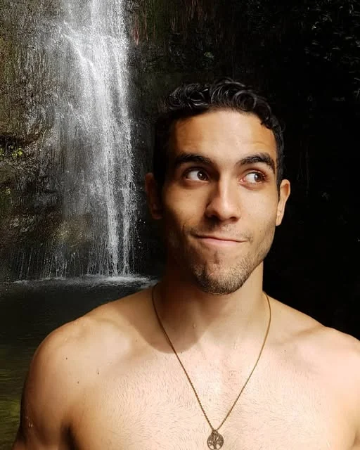 Raphael in front of a waterfall