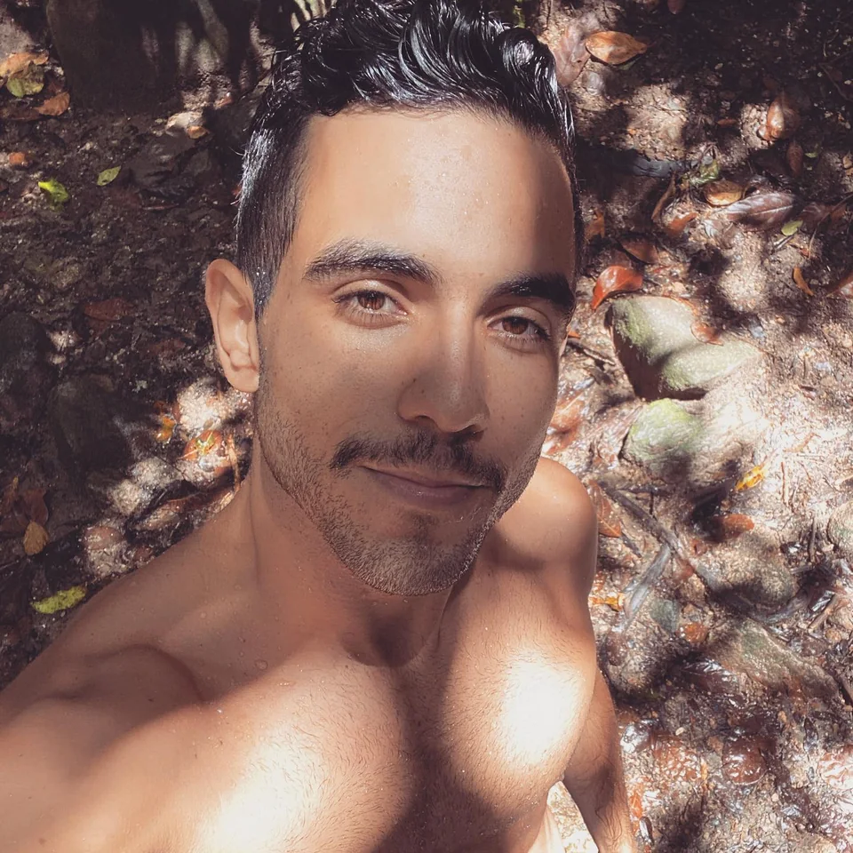Raphael selfie in a sunlit forest